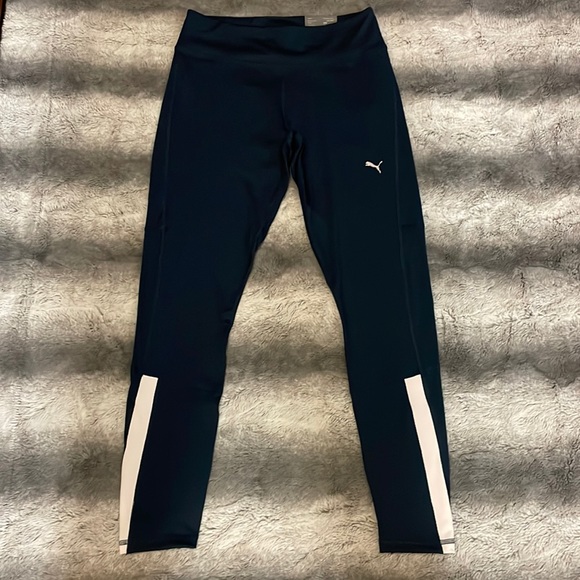 Puma Pants - NWT PUMA athleisure pants. Dark blue and white. Logo in silver. Size Medium.